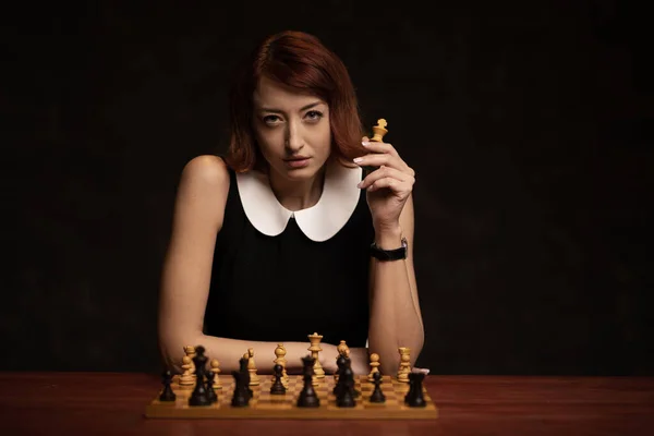 Beautiful Red Hair Woman Playing Chess Dark Background — Stock Photo, Image
