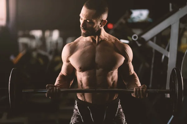 Confident Man Portrait Gym Lifting Barbell Dramatic Light — Stock Photo, Image