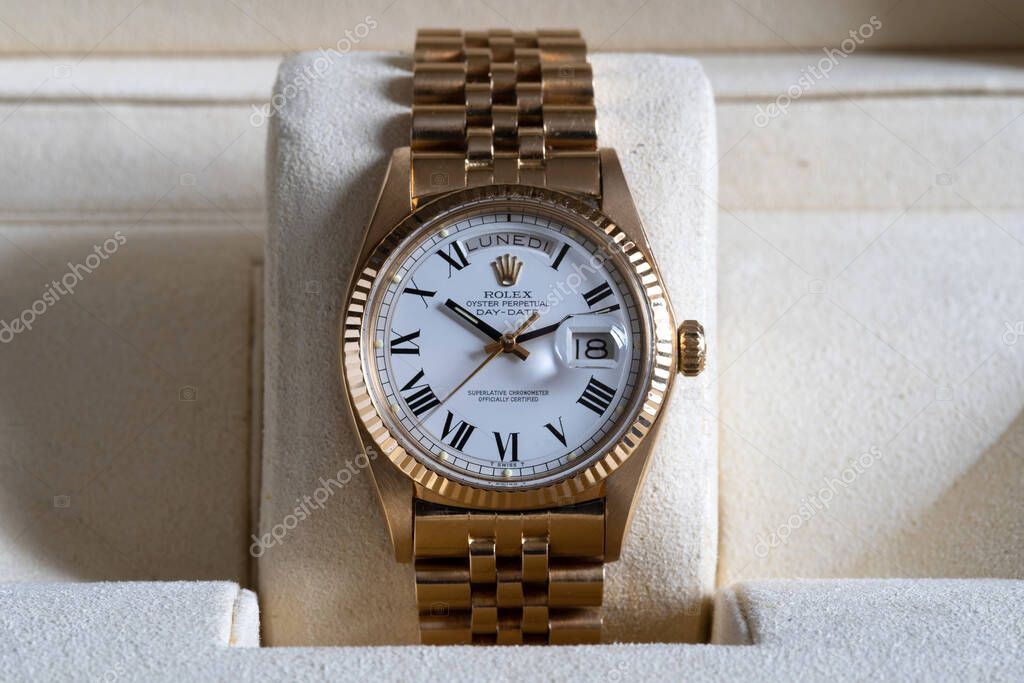 ROME - MAY, 2019: Rolex Oyster Perpetual Day Date gold watch. Rolex SA is a Swiss luxury watchmaker, founded in London in 1905. Illustrative editorial.
