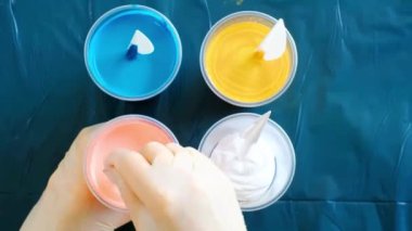 Fluid art painting. Background with liquid acrylic colors. Mixed paint. Mixing different paints.Modern art.