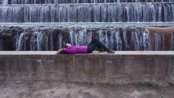 Woman Resting Man Made Beautiful Large Waterfall Many Stairs Aerial — Stock videók
