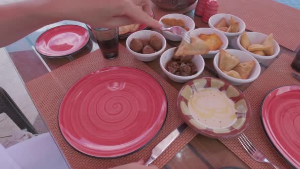 Egyptian Food Table Female Hand Knife Putting Sauce Restaurant Arabic — Stock Video