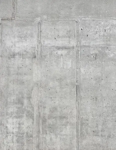 fragment of urban concrete wall of a building or fence. Concrete texture. Pattern or wallpaper