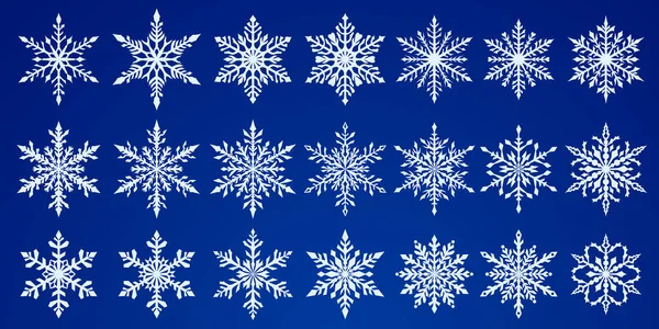 Conjunto Hermosos Copos Nieve Navidad Complejos Blanco Sobre Fondo Azul — Archivo Imágenes Vectoriales