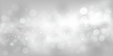 Beyaz ve gri tonlarda soyut bir arkaplan, bazıları odak noktasında, bazıları ise bulanık, büyüleyici bir bokeh etkisi yaratıyor..