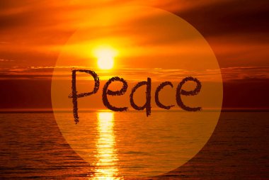 English Text Peace. Romantic Sunset Or Sunrise At Sea Or Ocean In The Background