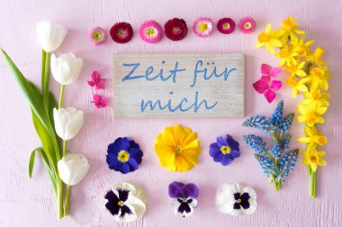 Sign With German Text Zeit Fuer Mich Means Time For Me. Flat Lay With Spring Flower Blossoms On Pink Wooden Background