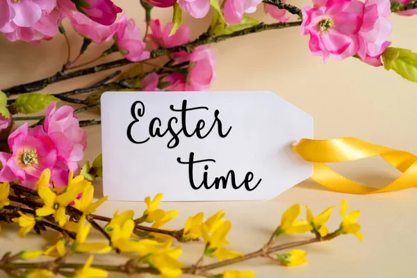 Spring Flower Arrangement With White Label With English Text Easter Time. Colorful Flower Branch Decoration With Yellow And Purple Blossoms.