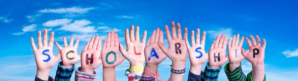 Children Hands Building Colorful English Word Scholarship Blue Sky Background — Stock Photo, Image