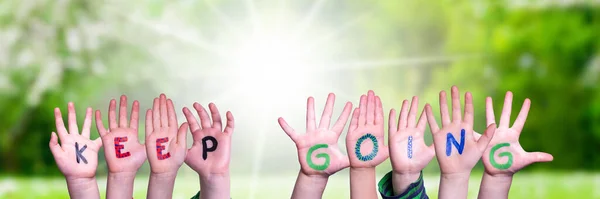 Children Hands Building Colorful English Word Keep Going Sunny Green — Stock Photo, Image