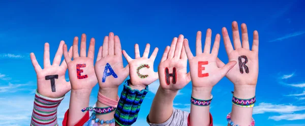 Children Hands Building Colorful English Word Teacher Blue Sky Background — Stock Photo, Image