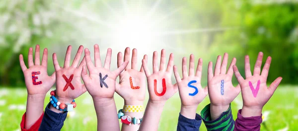 Children Hands Building Colorful German Word Exklusiv Means Exclusive Sunny — Stock Photo, Image