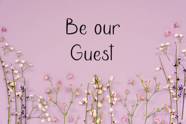 White And Purple Spring Flower Arrangement With English Text Be Our Guest. Lavender Color Paper Background