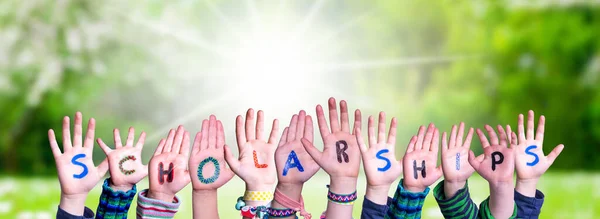 Children Hands Building Colorful English Word Scholarships Prado Grama Verde — Fotografia de Stock