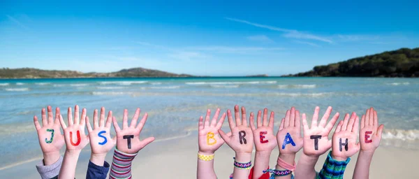 Children Hands Building Colorful English Word Just Breathe Summer Ocean — Stock Photo, Image