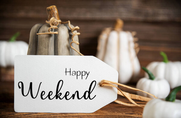 Autumn Decoration With Pumpkins, Rustic fall Decoration With Label Text Happy Weekend