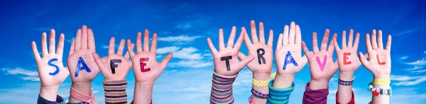 Children Hands Building Colorful English Word Safe Travel Blue Sky — Stock Photo, Image