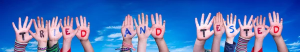 Children Hands Building Colorful English Word Tried Tested Blue Sky — Stock Photo, Image