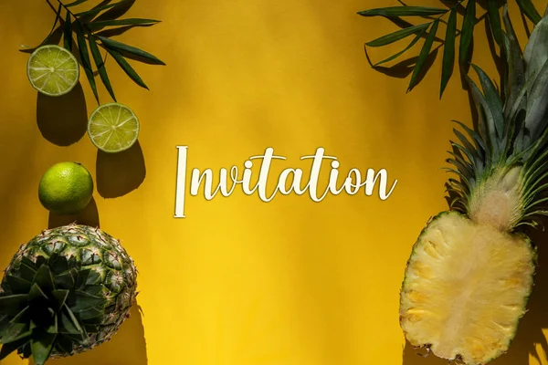 Yellow Flat Lay With English Text Invitation. Yellow Summer Background With Tropical Fruits Like Lemon And Pineapple And Palm Leaf.