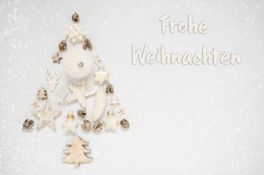 Noel süslemesinden çıkmış bir Noel ağacı ve Almanca 'dan gelen ve Weihnachten yazısıyla birlikte beyaz arka plan.