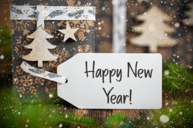 Yeni yılınız kutlu olsun, etiketli, Noel hediyeli, kar yağışlı çevre dostu kış dekoru.