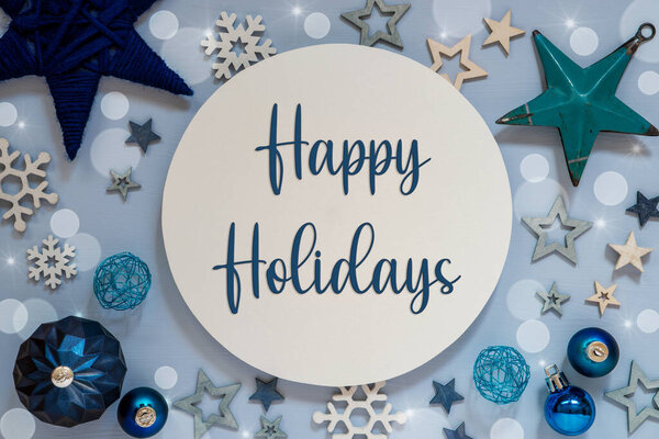 Синие елочные украшения со стартами, елочными балами и надписью "С праздником!"