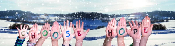 Kinderhände Die Bunte Englische Wörter Bauen Wählen Hoffnung Weiße Winter lizenzfreie Stockfotos