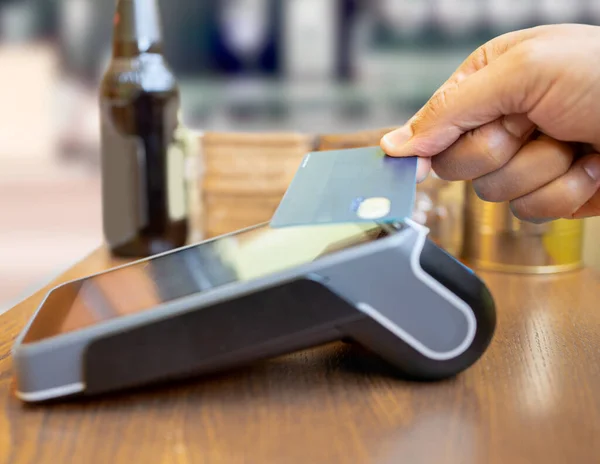 stock image Side view of credit card contactless payment at shop