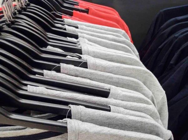 Close -up of clothes on hangers in store