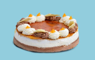 Massini cake, cream and truffle isolated on a blue background