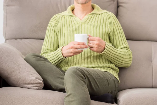 Front View Legs Man Holding Cup Coffee Winter Sitting Couch — Stock Photo, Image