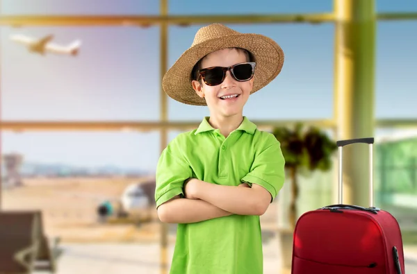 Child Vacation Wearing Green Shirt Hat Sunglasses Airport Happy Face — Stock Photo, Image