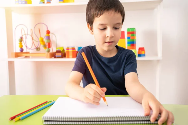 High Angle Shot Child Hand Draws Orange Pencil — Stock Photo, Image