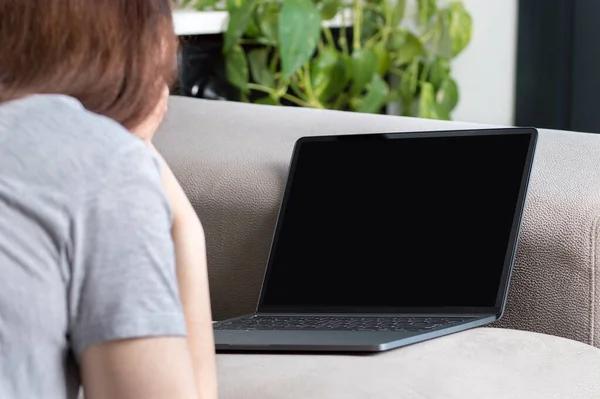 Back View Woman Watching Media Content Laptop Showing Blank Screen — Foto Stock