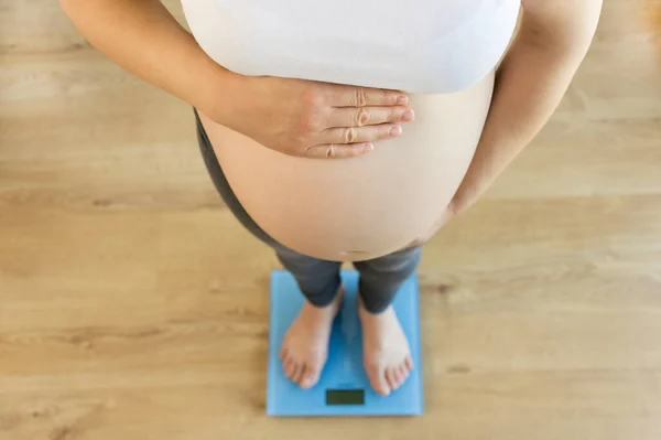 Cropped High Angle Shot Pregnant Woman Weighing Herself Scale Home — Stock Photo, Image