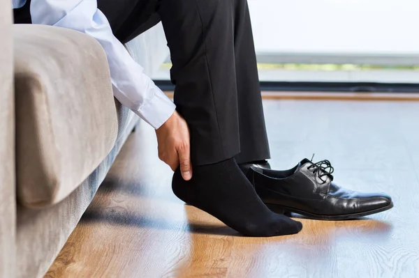 Tired Businessman Joint Ache Touching Her Ankle Sitting Couch Home — Stock Photo, Image