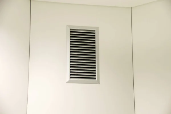 Ventilation grids on wall of building, indoors