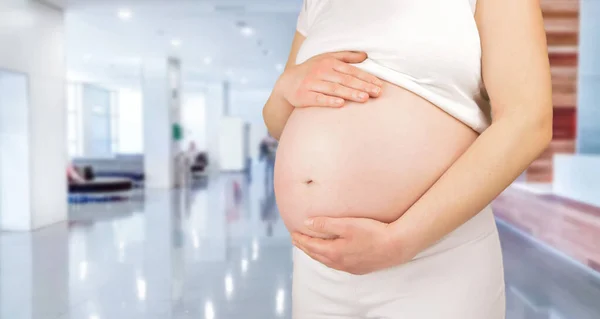 Closeup Pregnant Woman Holding Her Tummy Hospital — Stock Photo, Image