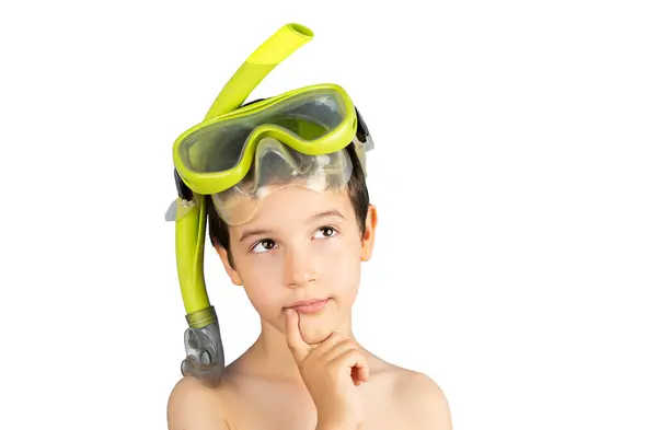 stock image Pensive boy with snorkel mask tuba and snorkel looks away thinking isolated on a white background, funny kid lips hold finger near mouth,conceptual image.Snorkeling, swimming,vacation concept.