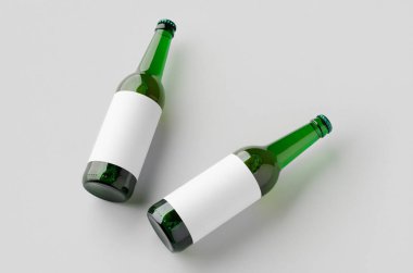 Uzun boyunlu yeşil bira şişesi. Üstünde boş etiket var..