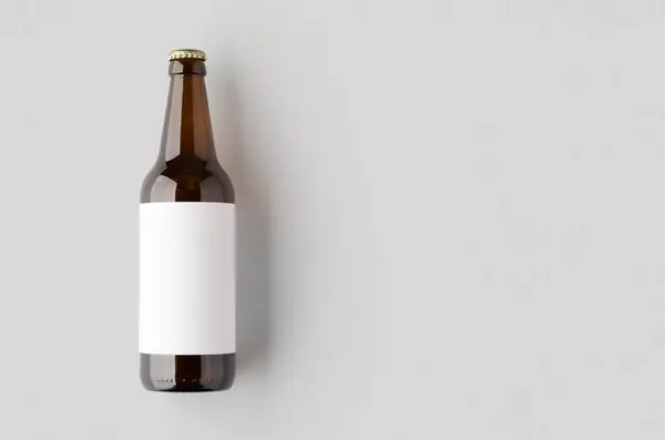 stock image Amber beer bottle mockup with a blank label and copyspace.