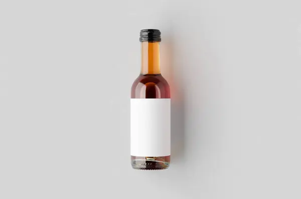 stock image Small rose wine bottle mockup. Bordeaux shape.