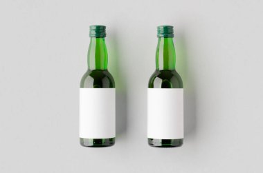 Miniature spirits, liquor bottle mockup. Green glass with a blank label. clipart