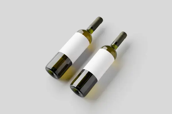 stock image White wine in a green bottle mockup with a blank label.