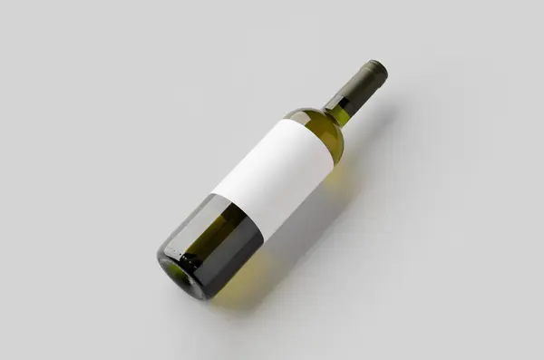 stock image White wine in a green bottle mockup with a blank label.