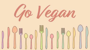 Metin ve kaşık çatal bıçak sembolleriyle Vegan konsepti animasyon videosu.
