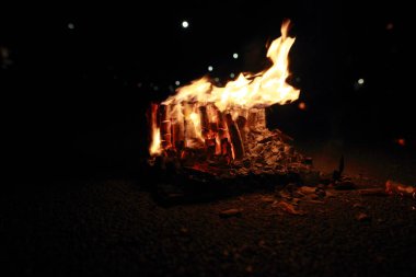 Hoogeveen, Netherlands- January 1, 2025: burning fireworks remains, Netherland clipart