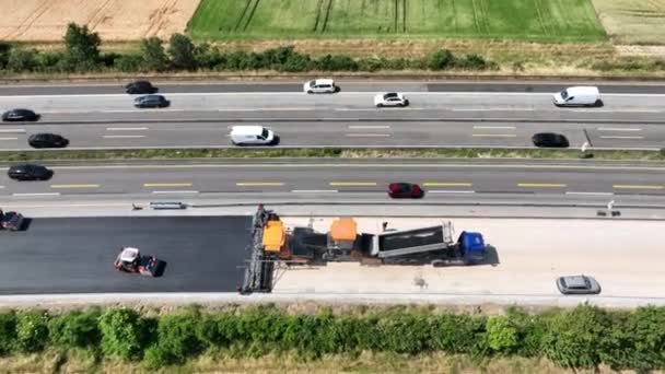 Large Construction Site Road Works Asphalt Paving Machine Aerial View — Stock Video