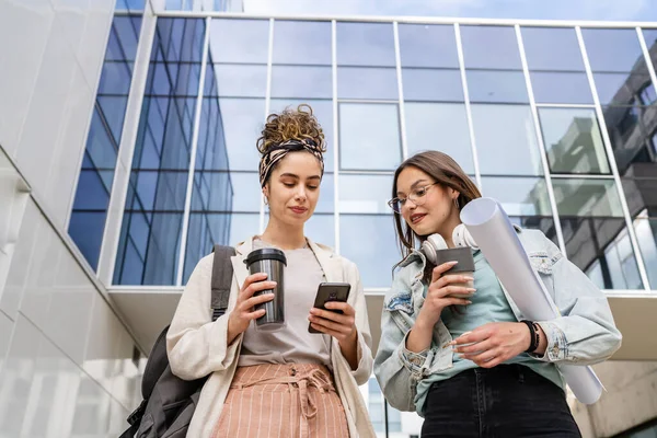 Two Women Female Students Walk Front Modern University Building Notes — Stock Photo, Image