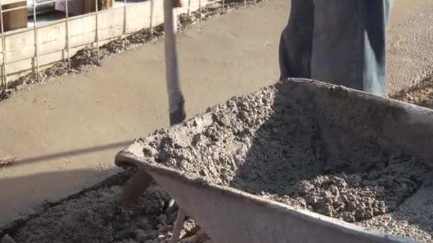 Midsection Unknown Man Hold Shovel Putting Cement Concrete Ground Building — Stock Video